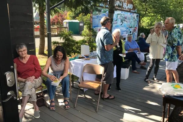 Community gathering at the Camano Gateway Gallery patio